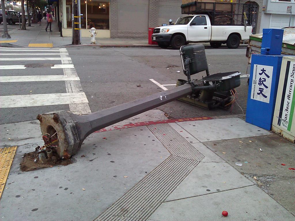 A downed streetlight at 20th Avenue and Geary