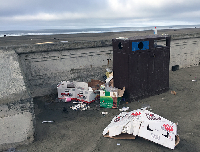 The usual scene on the Ocean Beach promenade - undersized garbage cans that can't handle the demand.